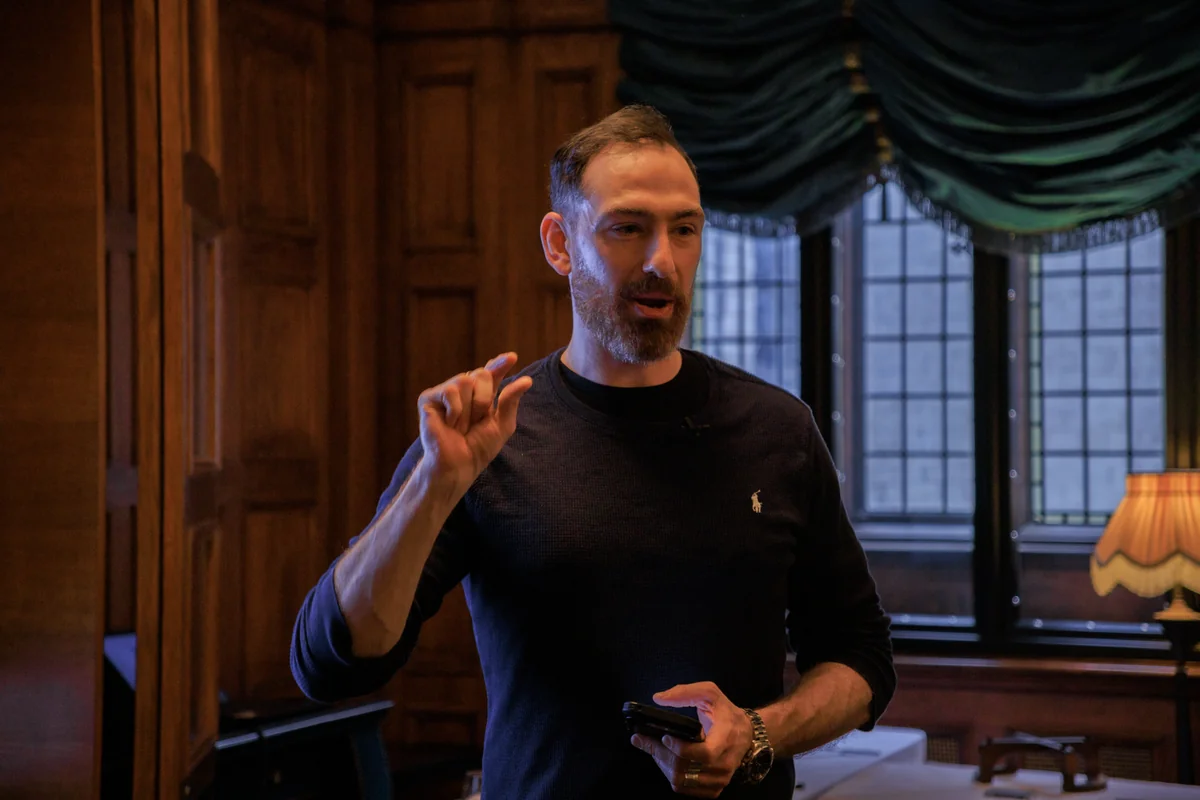 Zac Hansen speaking at a live event